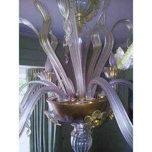 Close-up of the floral details on the Classic Three-Tier Murano Glass Chandelier’s crystal arms.