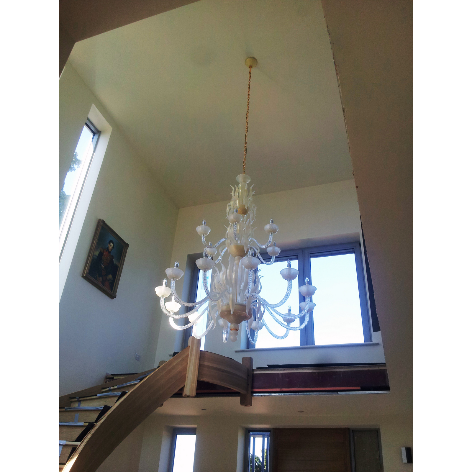 Side view of Classic Three-Tier Murano Glass Chandelier in a modern interior setting.