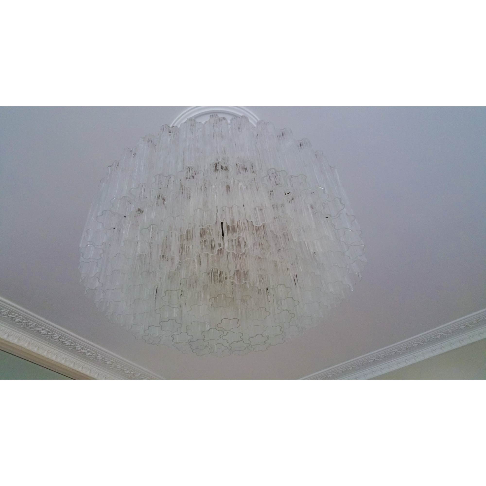 Artistic angle of the chandelier's structure, emphasizing the texture of the Murano glass.