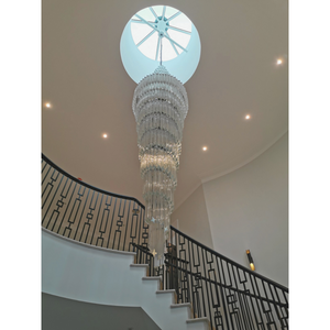 Full view of the 300cm Double Spiral Murano Quadriedri Chandelier installed under a skylight, illuminating the space