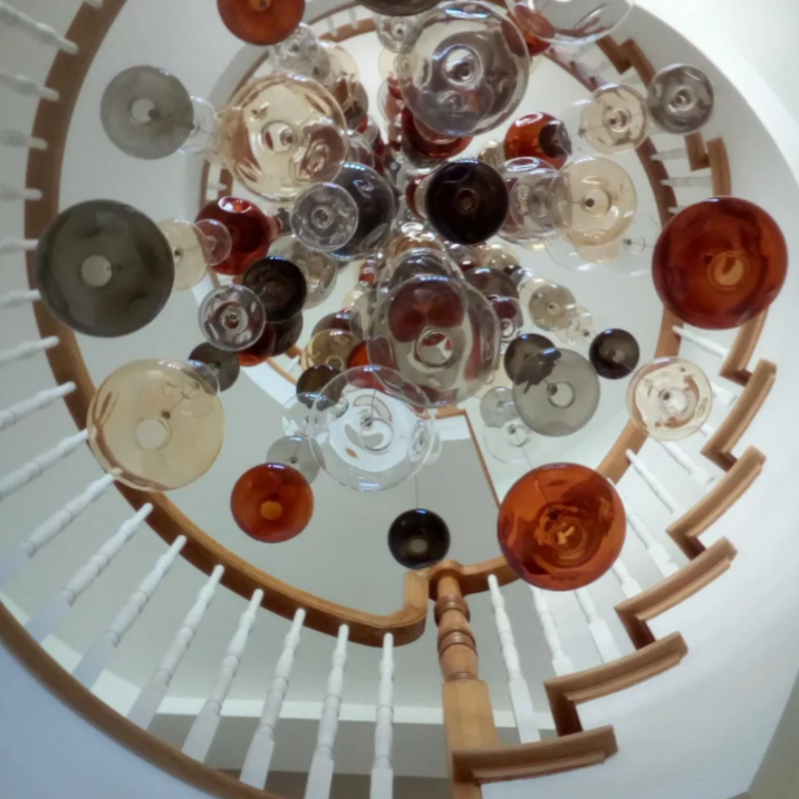 20 Ft Tall Bespoke Stairwell Chandelier With Coloured Glass Bubbles