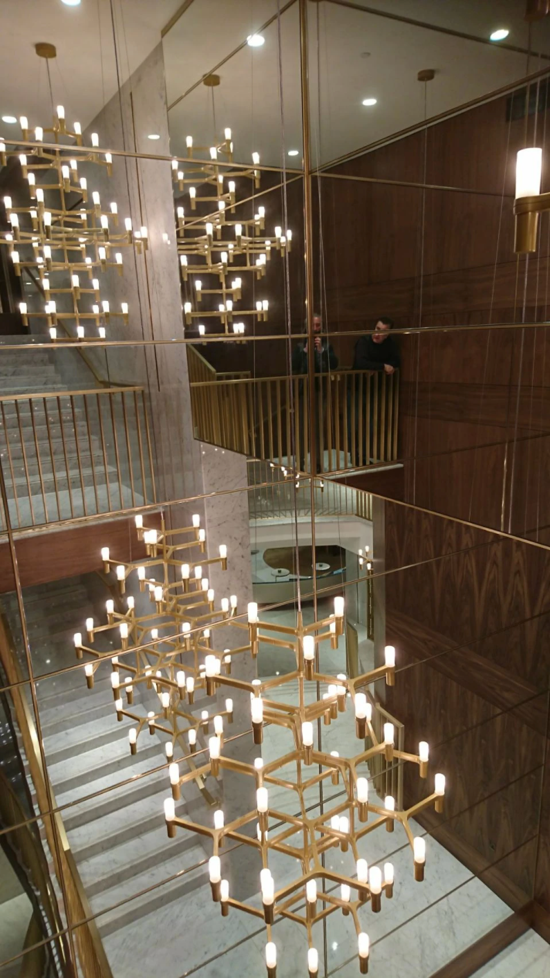 Large bespoke modern ceiling lighting installation for a top London hotel