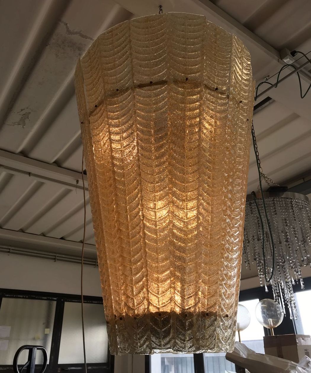 Tall bespoke amber lanterns with amber flecks